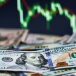 Em semana marcada pela manuteção dos juros pelo Fed e corte da Selic pelo Banco Central do Brasil, dólar subiu ante real e Ibovespa recuou